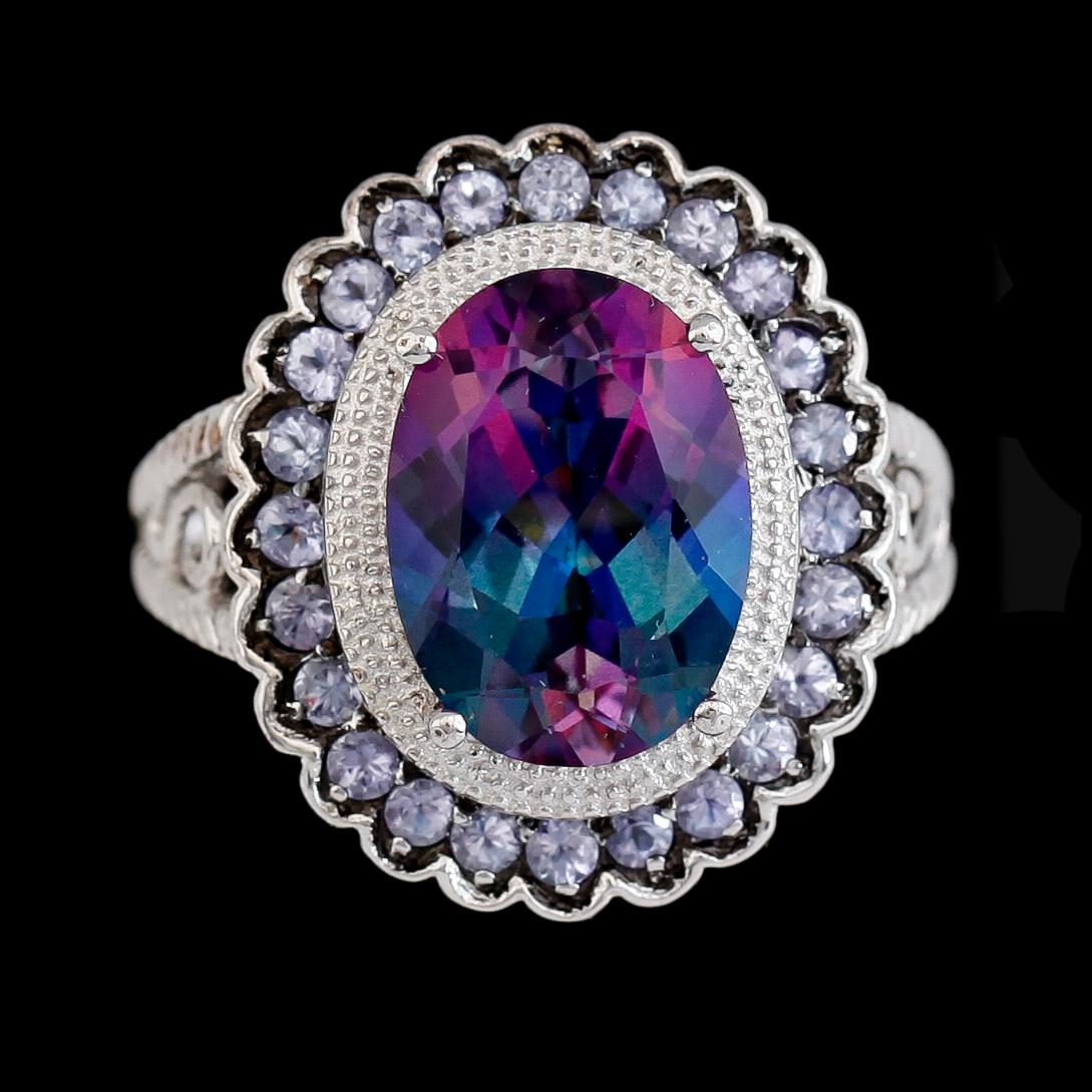 RING, sterlingsilver, färgad topas ca 5.00 ct, tanzaniter tot ca 1.50 ct.