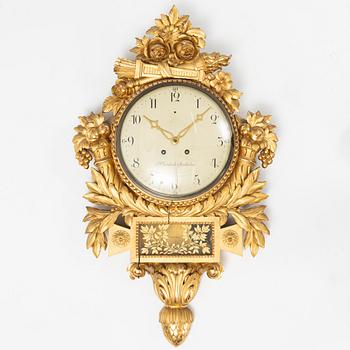 A Gustavian style wall clock, F.W. Grönbäck, Stockholm 1918.