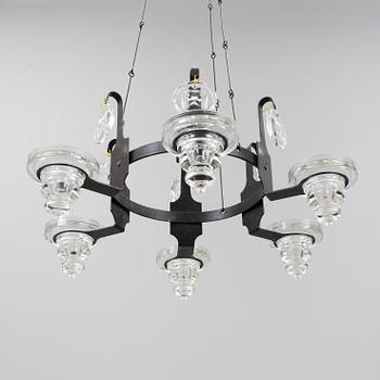 An ERIK HÖGLUND iron and glass chandelier, second half of the 20th Century.