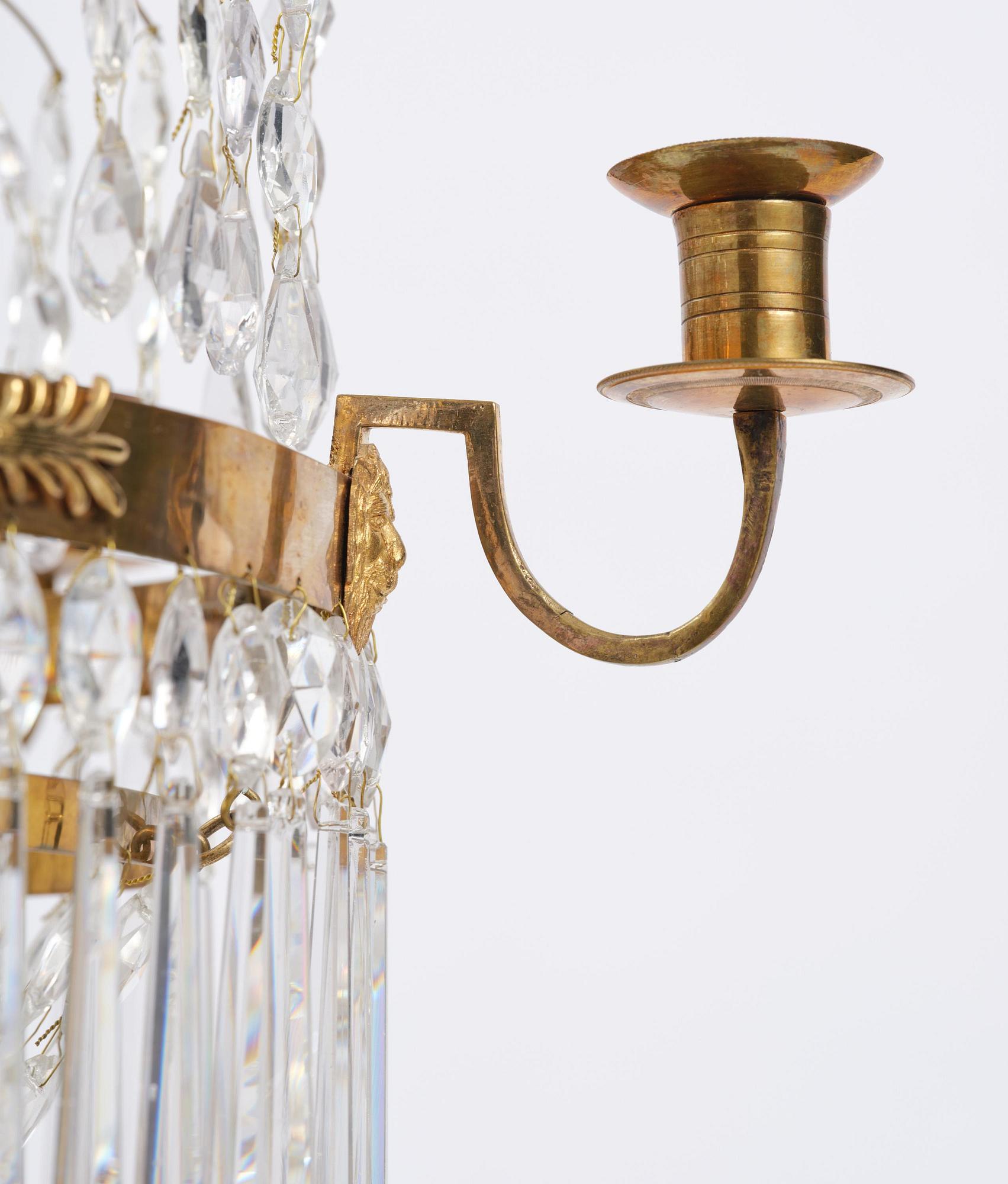 A late Gustavian gilt brass and cut glass seven-light chandelier, Stockholm, late 18th century.