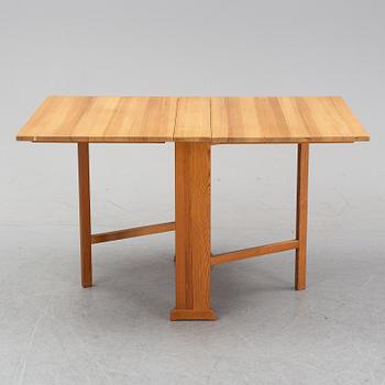 A Carl Malmsten pine percussion table "the armourer" (Vapensmeden).