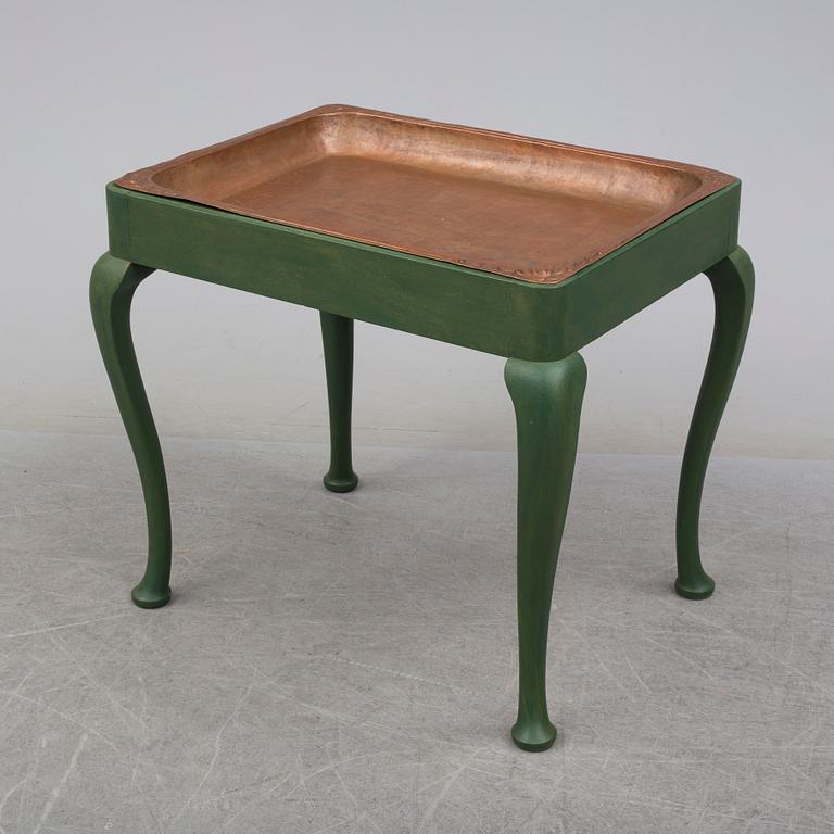 An early 20th century table by AB Nordiska Kompaniet.