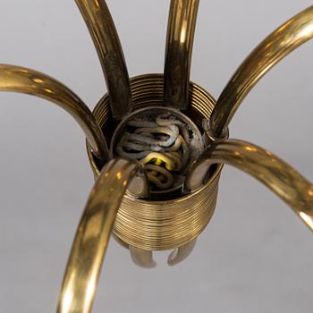 Paavo Tynell, a six-armed brass pendant ceiling light, Taito/ Idman, mid-20th century.