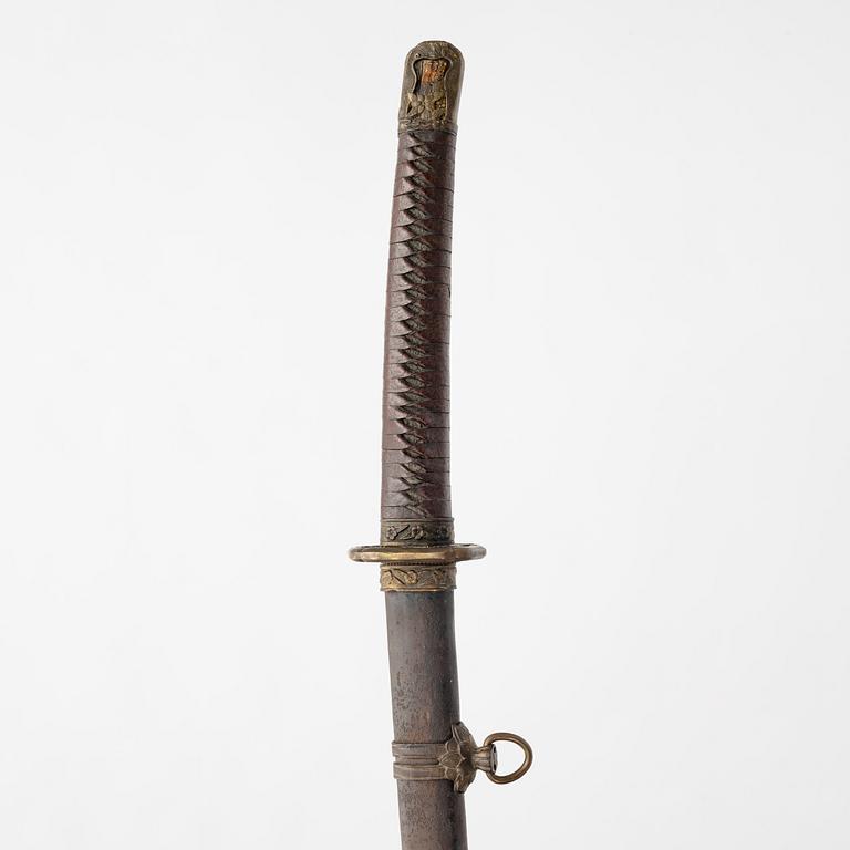 A Japanese sword, 20th century mounting.