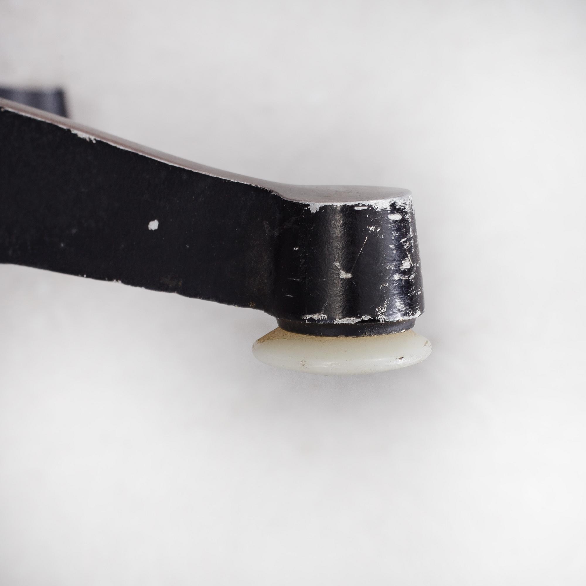 An easy chair and ottoman by Charles & Ray Eames, Herman Miller, USA, produced with licence by Hille, London.