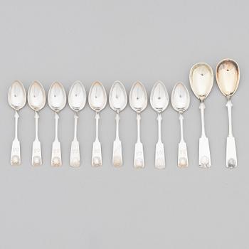 A 42-piece set of silver cutlery with seashell decorated handles, Finnish hallmarks, 1918-1950.