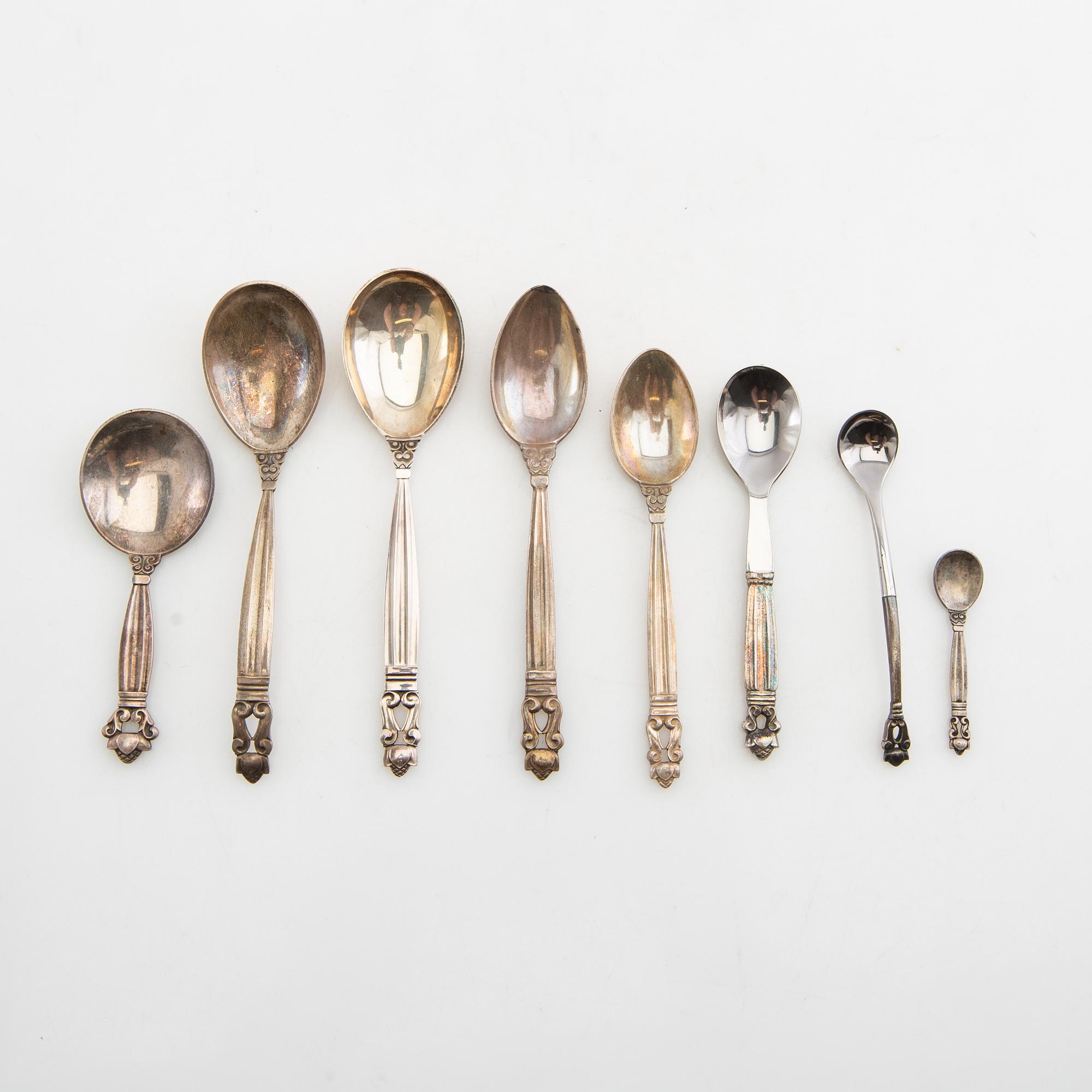 Johan Rohde, serveringsskedar 13 st "Konge/Achorn" sterlingsilver för Georg Jensen efter 1945.