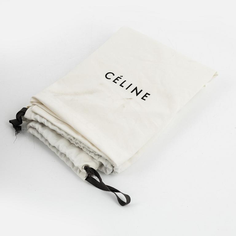 Céline, a beige leather 'Luggage' bag.