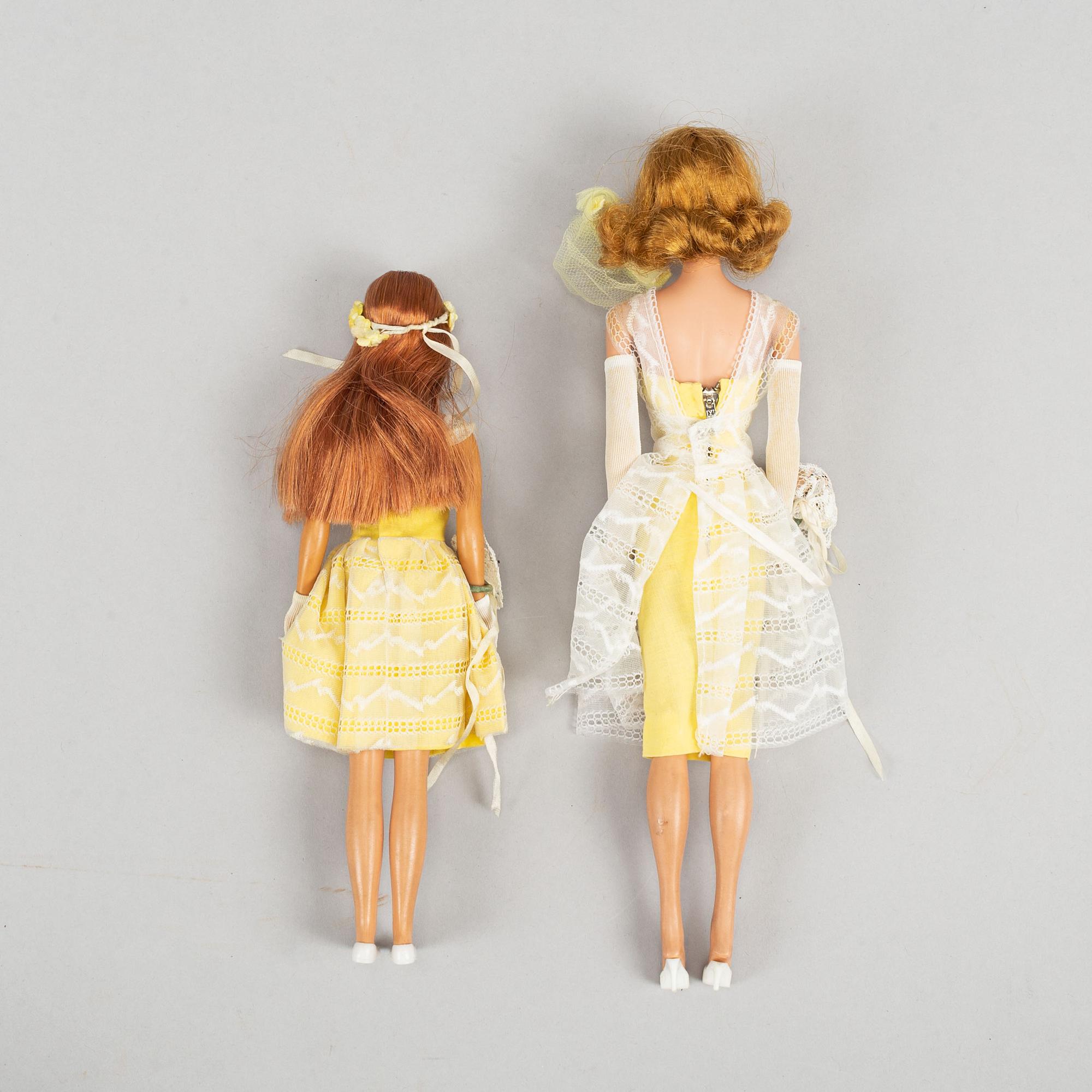 A collection of four Mattel 1960's Barbiedolls with accessories.