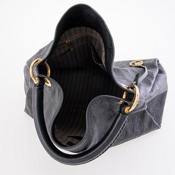 LOUIS VUITTON Black Monogram Empreinte Artsy MM Bag.