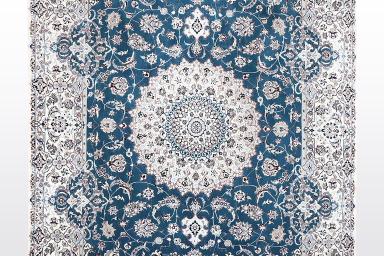 A carpet, Nain, part silk, 6 Laa, ca 312 x 208 cm.
