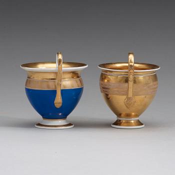 A pair of Russian Gardner Empire cups with stands, early 19th Century.