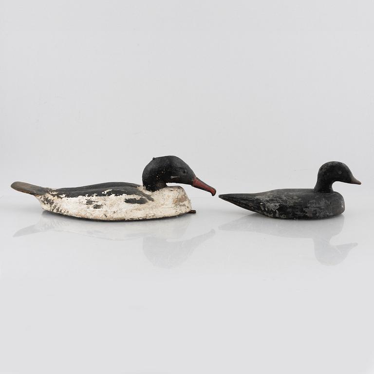 A set of six wooden duck decoys, 20th century.