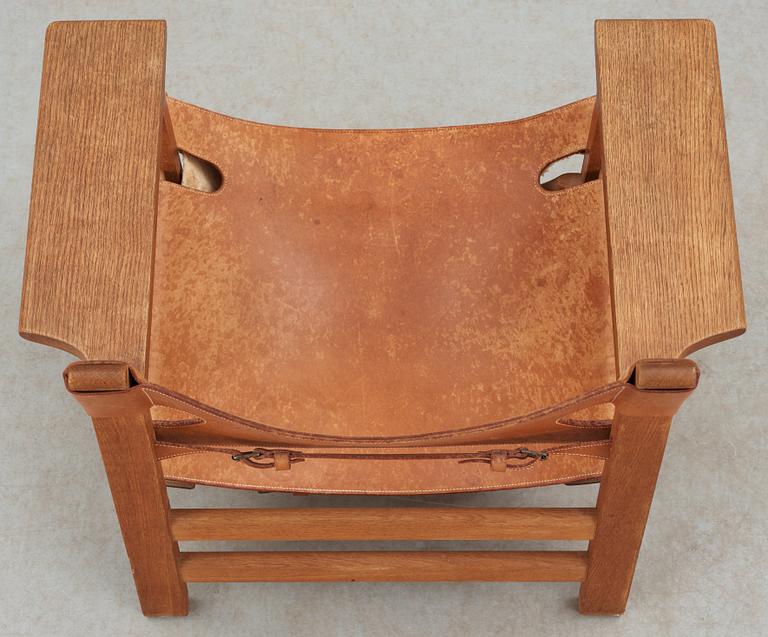 A Børge Mogensen oak and leather 'Spanish Chair' by Fredericia Stolefabrik, Denmark.