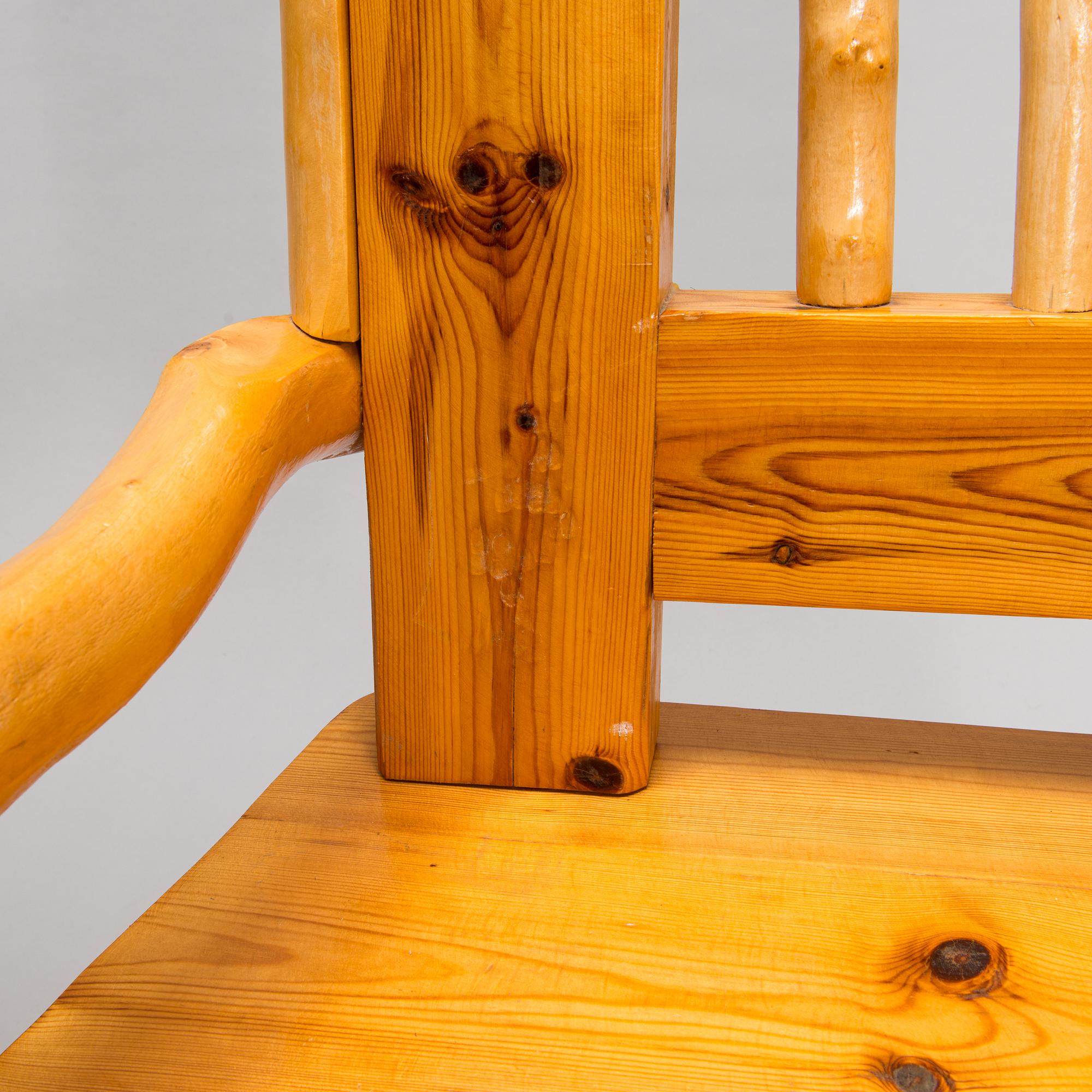 A pair of mid-20th-century armchairs made by Tauno Saarela Kuusamo Finland.