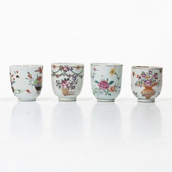 A group of 12 famille rose cups, Qing dynasty, Qianlong (1736-95).