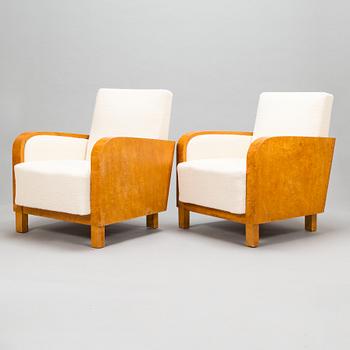 A pair of 1930's armchairs.