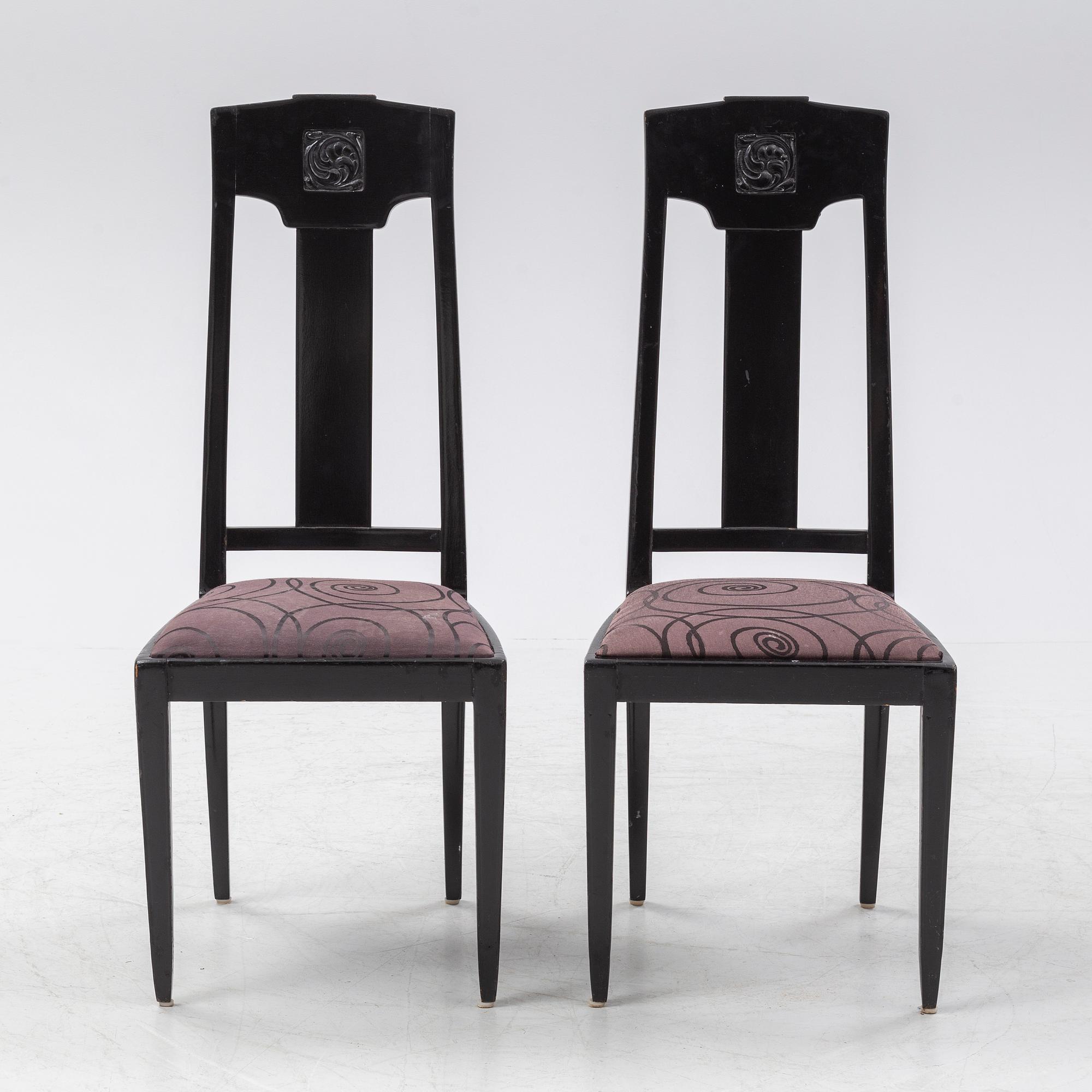 Ten carved oak chairs, Myrstedt & Stern A.-B., Stockholm, early 20th Century.