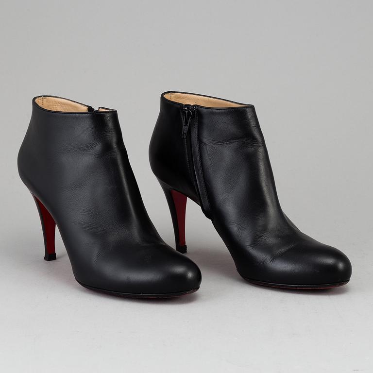 CHRISTIAN LOUIBOUTIN, a pair of black leather boots, size 40.