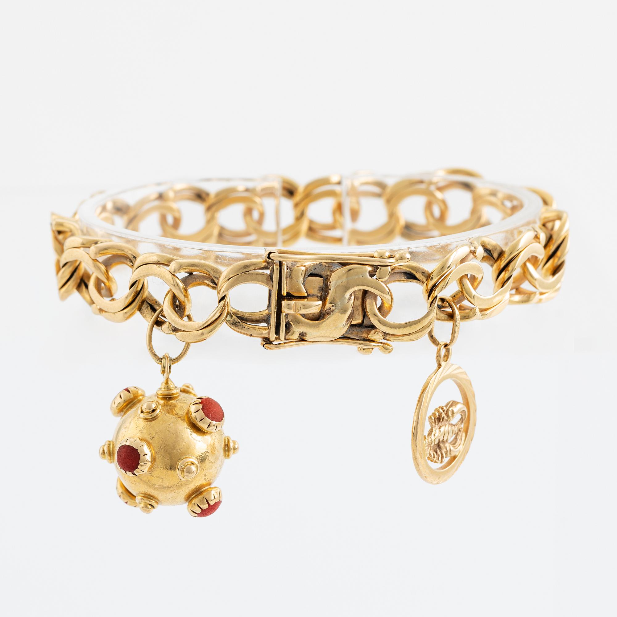 Gold charm bracelet.
