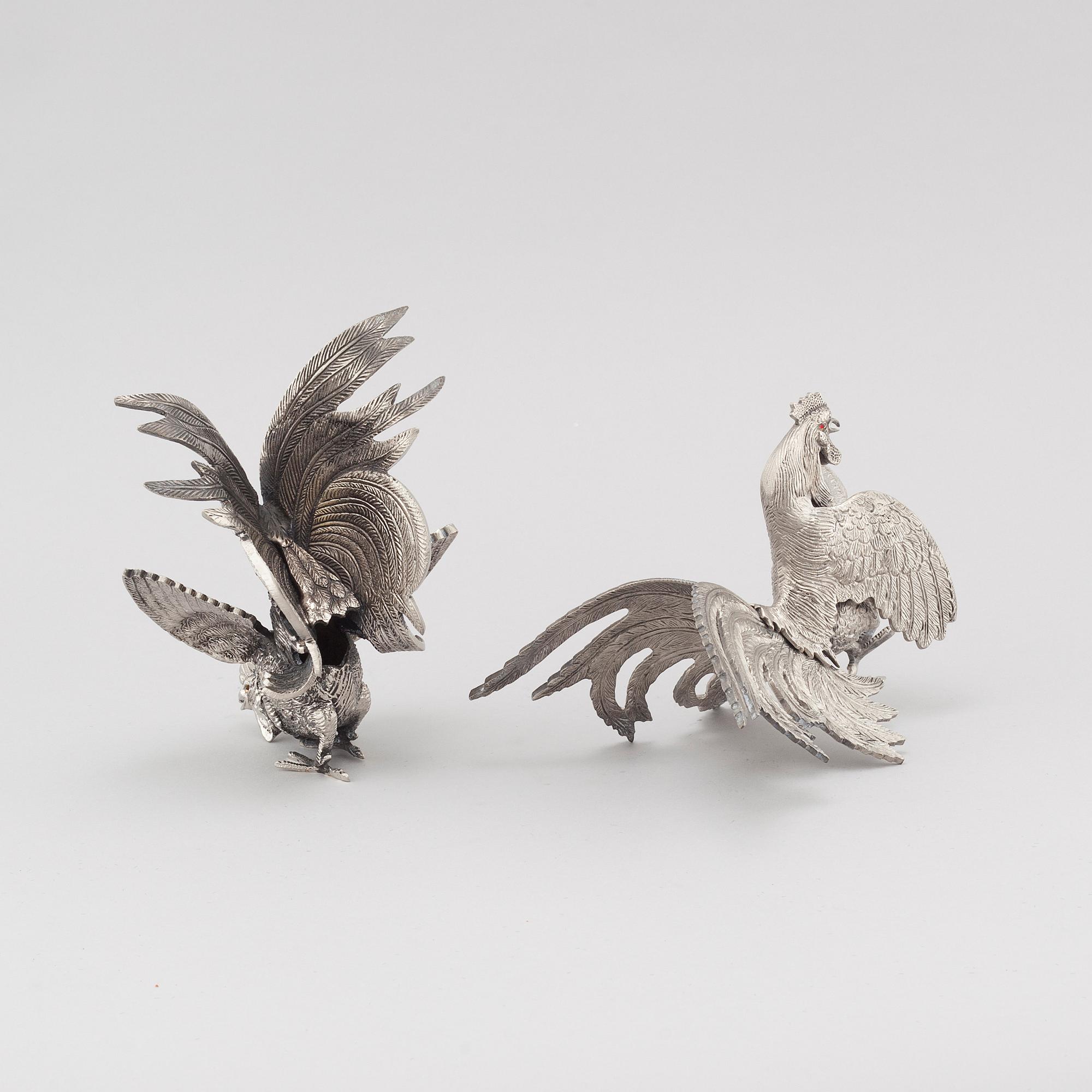 A pair of table decorations in white metal, second half of the 20th century.
