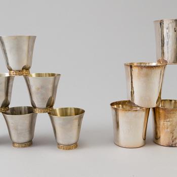 Two sets of six silver beakers by Markströms Guldsmeds, Uppsala, 1959 and 1970. Total weight ca 592 g.