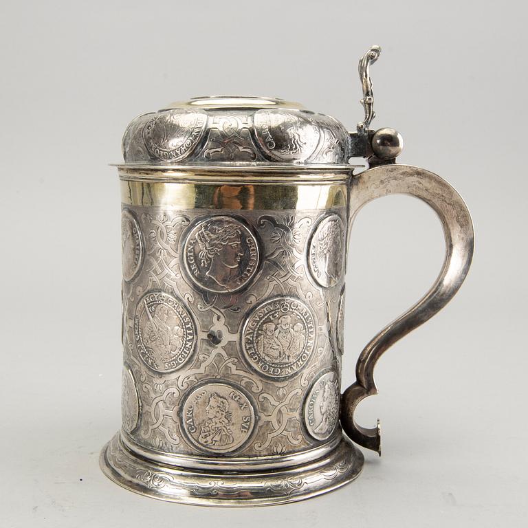 A German 18th century parcel-gilt silver coin-tankard, mark of Johann Friedrich Beyer, Schweidnitz (1736-1775).