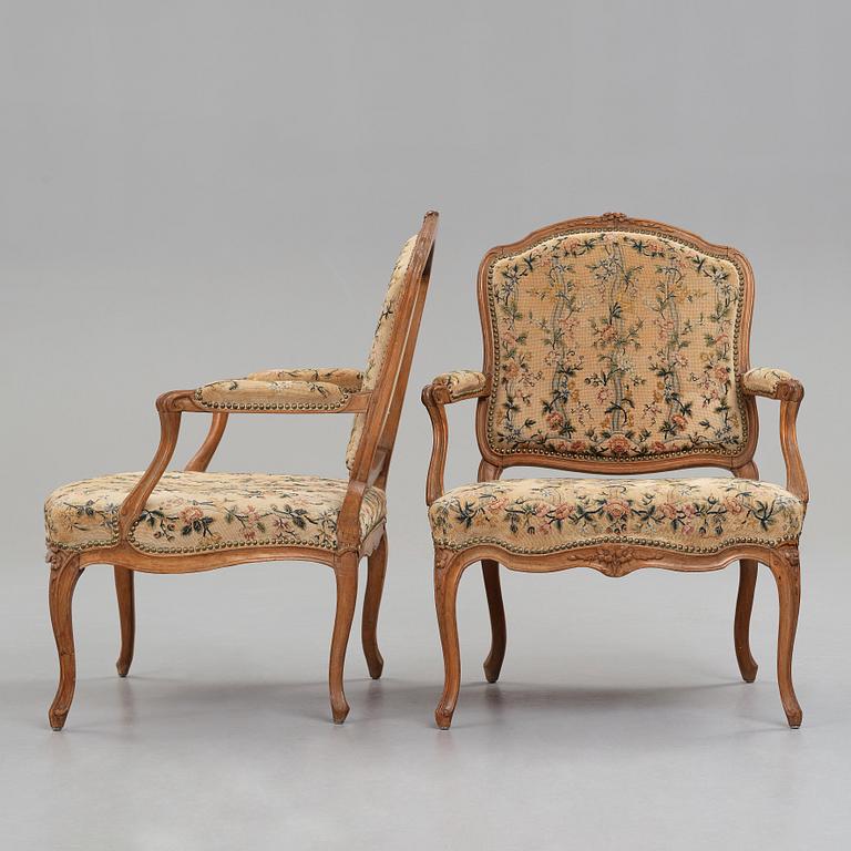 Two matched Louis XV armchairs by Charles Francois Normand (master in Paris 1747), mid 18th century.