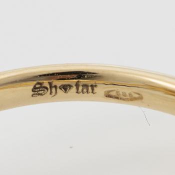 Ring 18K gold set with round brilliant-cut diamonds.