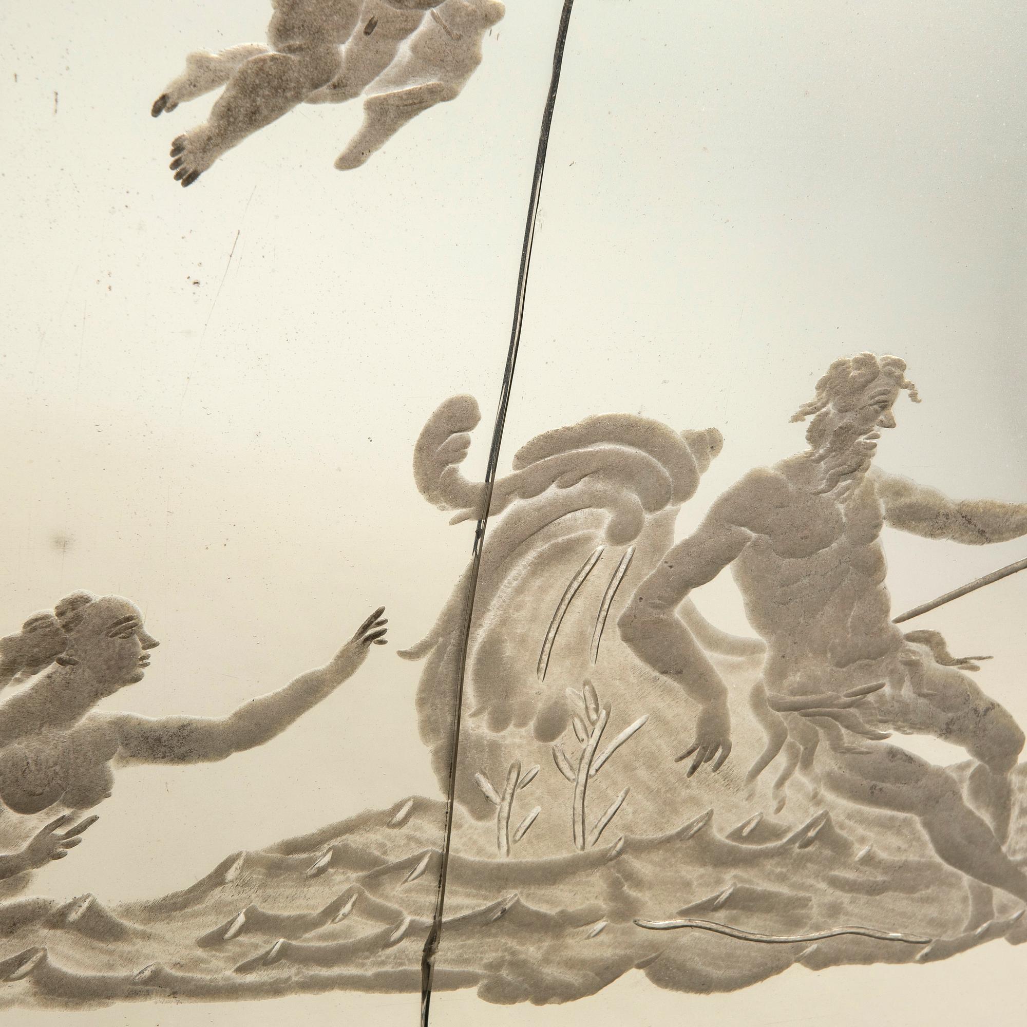 A gilded Louis XV style mirror around 1900.
