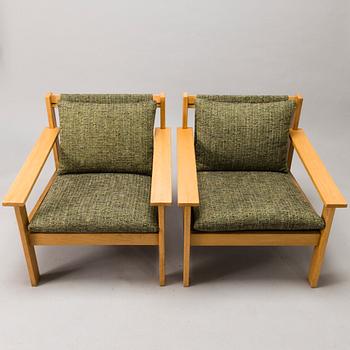 CARL GUSTAF HIORT AF ORNÄS,  a pair of 1960s, 'Tapio' armchairs for Puunveisto Oy - Wood work Ltd.