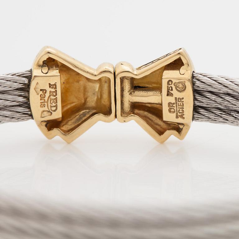 A Fred Paris "Force 10" bangle and ring.