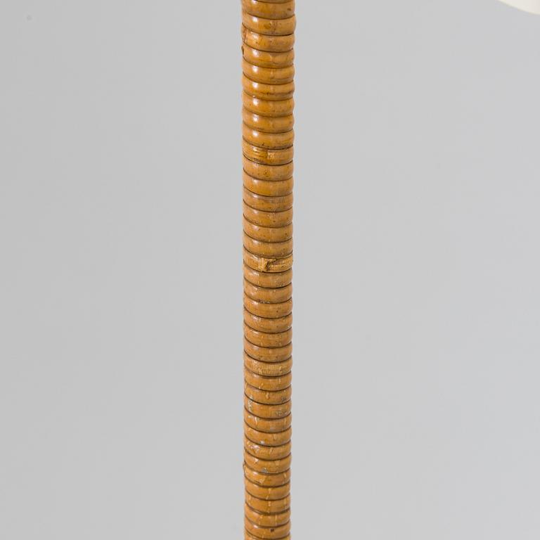 Paavo Tynell, a mid-20th century K10-10 floor lamp for Taito.