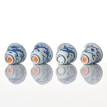A set of four blue and white dragon wine cups, 'Hatcher Cargo', 17th century.