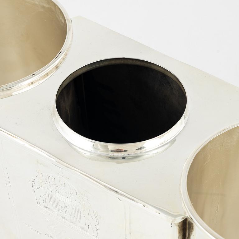 A contemporary silver plated wine cooler.