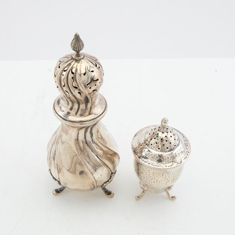 Ströare 2 st silver K Andersson Stockholm 1925 samt importstämplar.