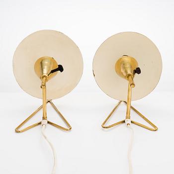 Two mid-20th-century wall lights / table lamps, model EV 57 for Itsu, Finland.