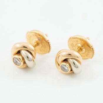 Cartier, earrings, a pair, "Trinity" 18K gold with round brilliant-cut diamonds.