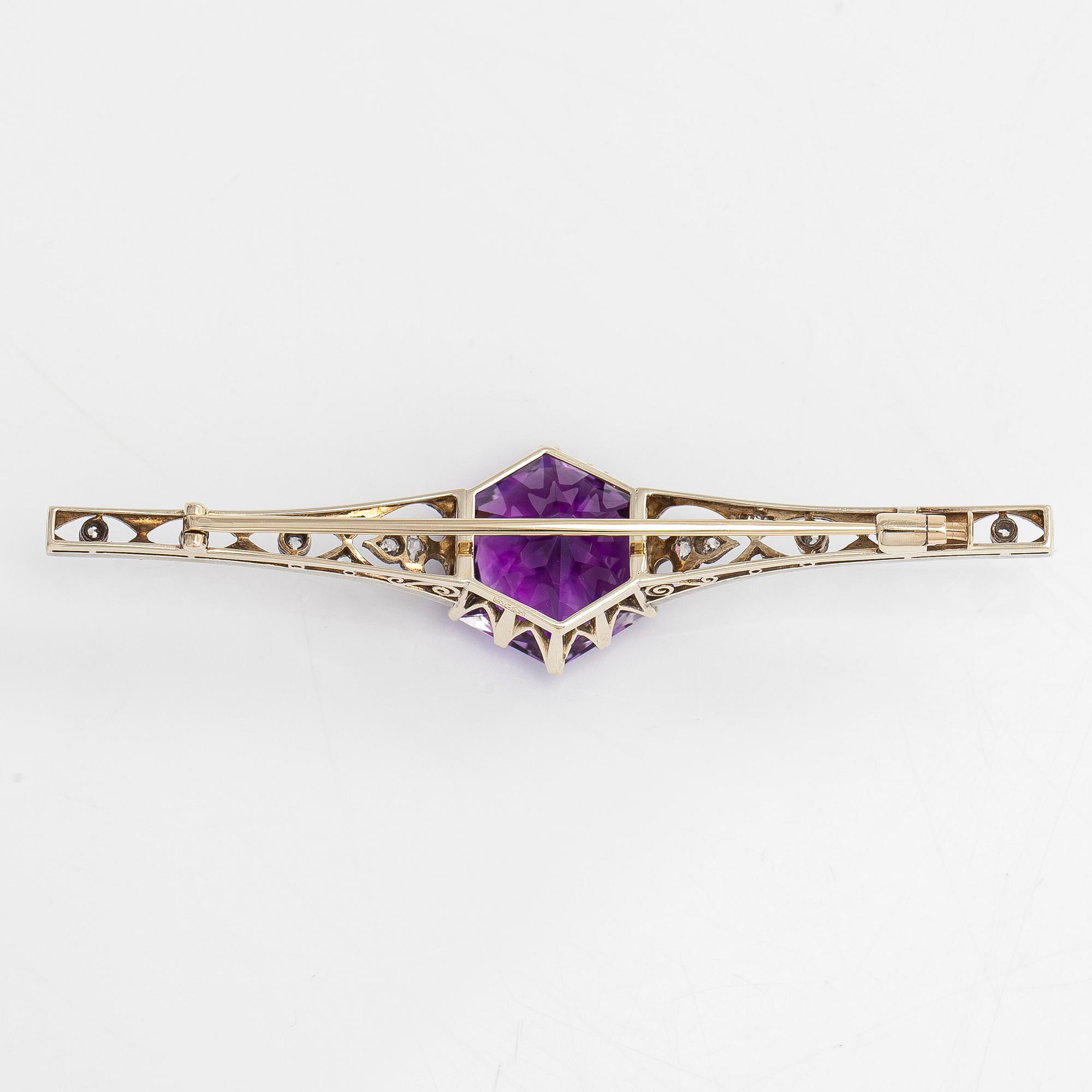 A 14K gold brooch, with an amethyst, old- and rose-cut diamonds,  early 20th century.