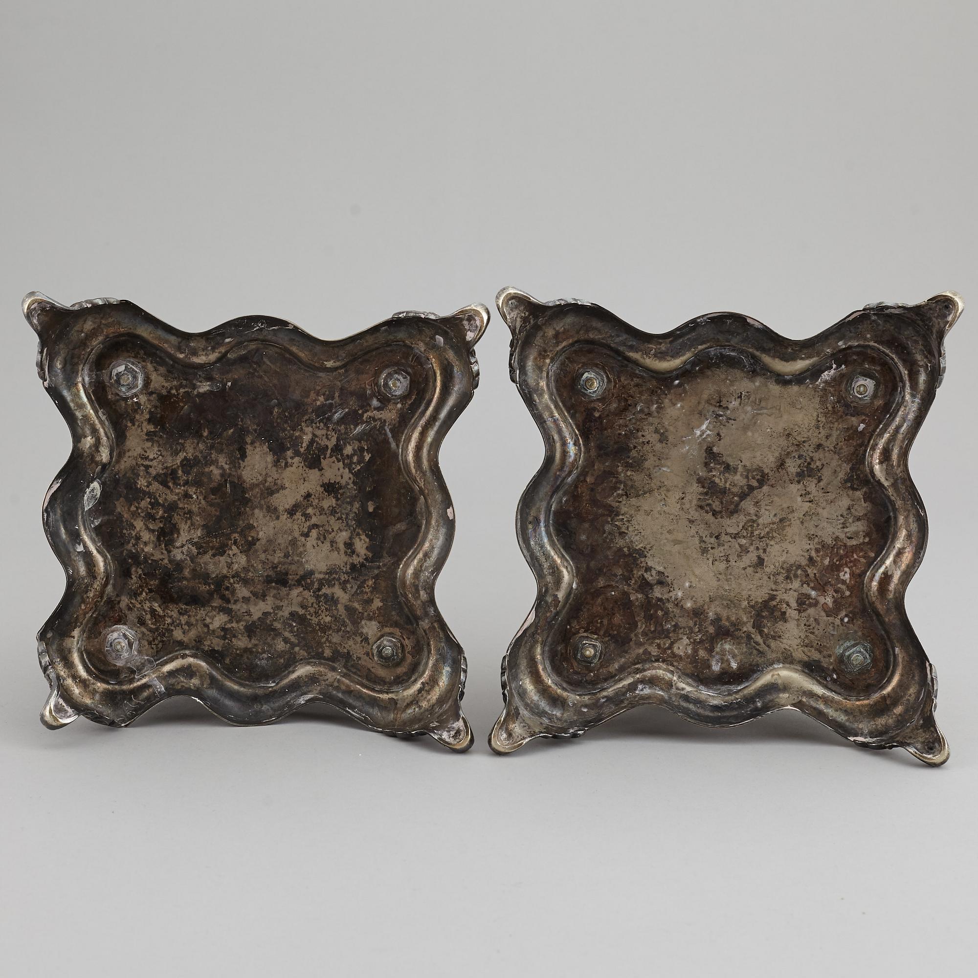 A pair of barocque style nine lights candelabra, silver plate, 20th Century.