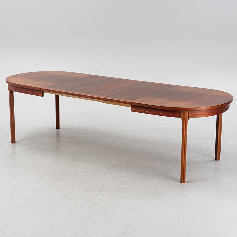 A rosewood-veneered dining table, Hugo Troeds, Björnum, Sweden, 1960's.