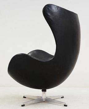An Arne Jacobsen black leather 'Egg' chair, Fritz Hansen, Denmark 1960's.