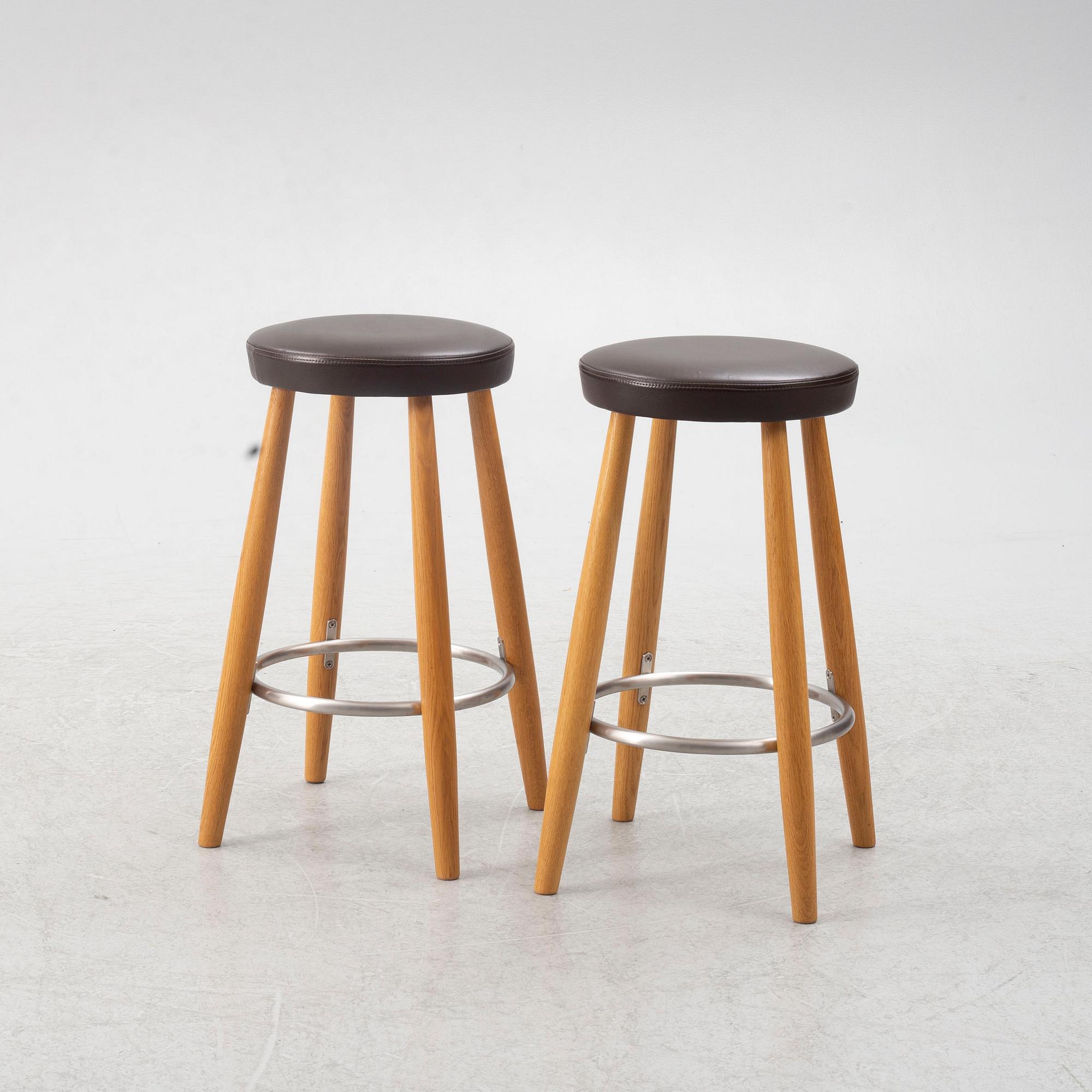 Hans J. Wegner, a pair of bar stools, CH 58, Carl Hansen & Son, Denmark, 21st century.