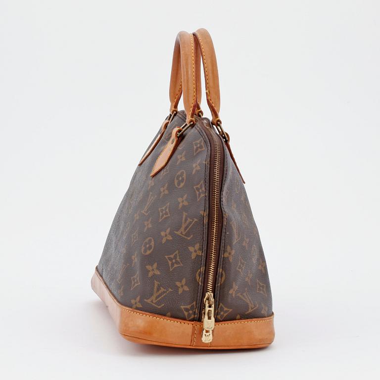 LOUIS VUITTON, a monogram canvas "Alma" bag.