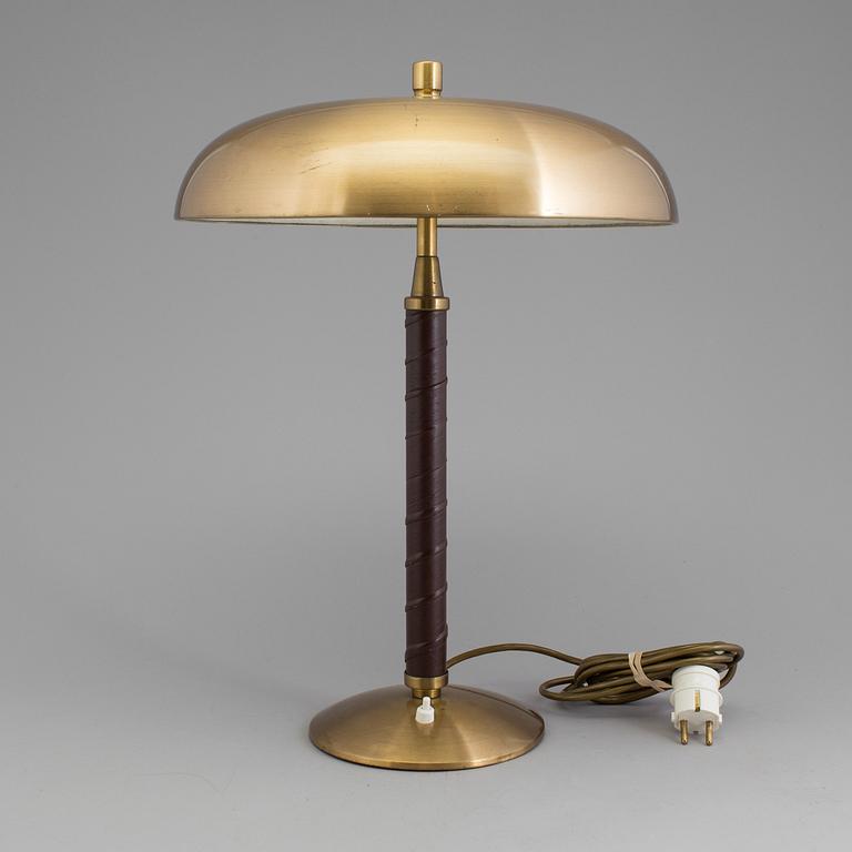 A Swedish 20th century brushed brass table lamp by Einar Bäckström, Malmö.