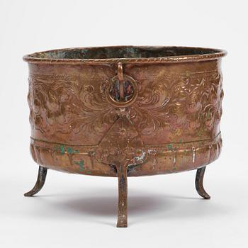 A Swedish baroque repousse copper cauldron, early 18th century.