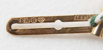 FRACKKNAPPAR, ett par, guld 18 K, med vardera briljant à 0,10 ct.