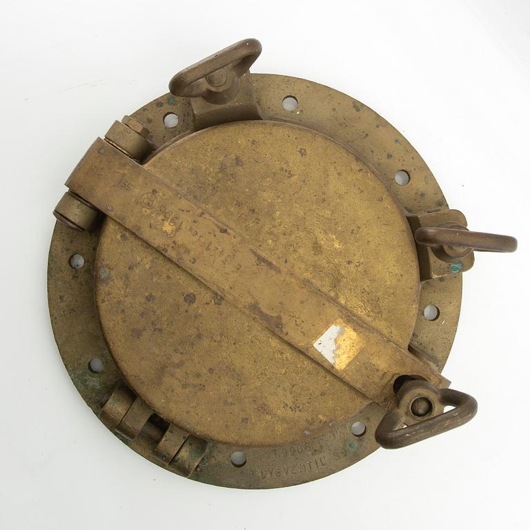 Vent / ship's window, dated 1966.