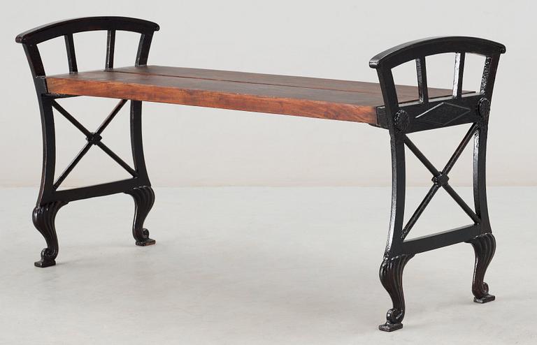 A Folke Bensow black lacquered cast iron and wood park bench, Näfveqvarns Bruk.