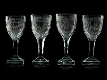 1364. A set of 21 cut and engraved Empire wine glasses, first half of 19th Century.